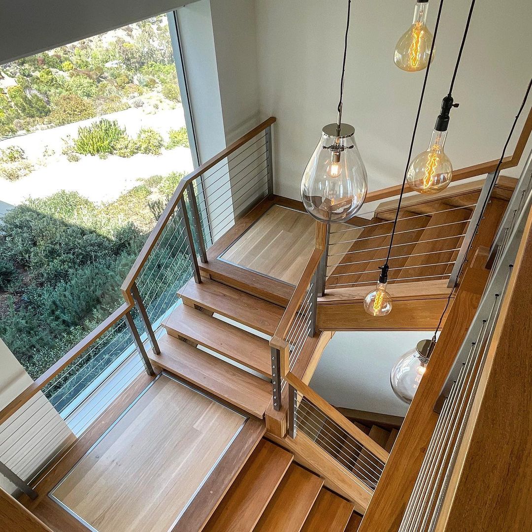 Solid teak three-story staircase, yeah it wasn’t easy…. #scottgillendesign #malibu